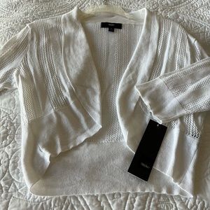Light sweater with sleeves, great to wear over a tank, tee or dress.
